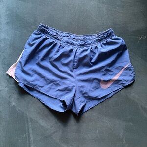 Nike Women's Blue Athletic Shorts with Pink Swoosh